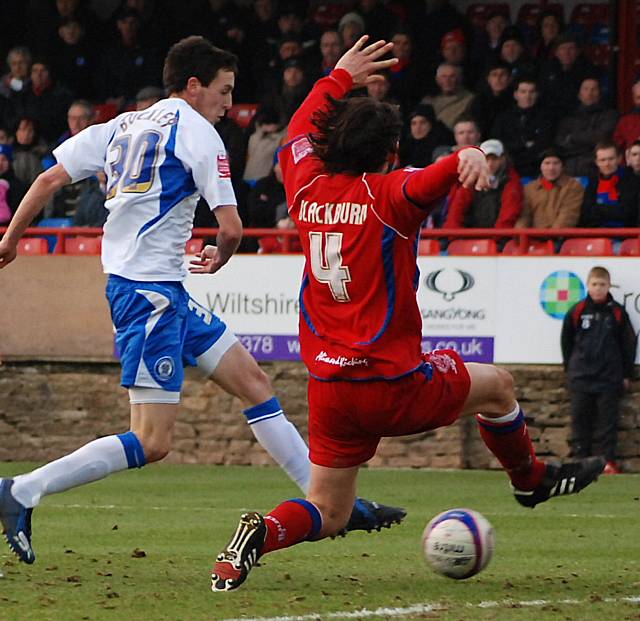 Buckley's shot is blocked by Chris Blackburn.