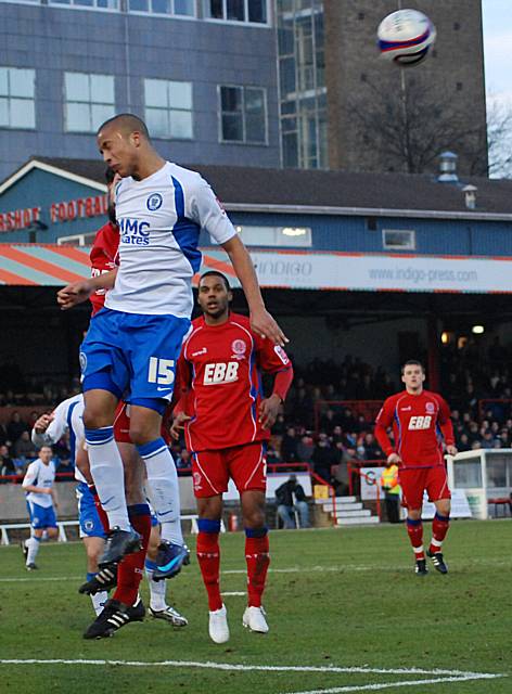 Thompson goes up for another header.