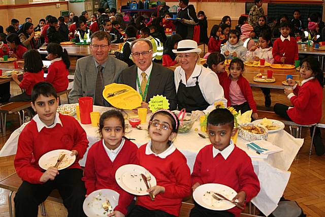 Clean plates all round: Headteacher Kevan Crowther, Councillor Keith Swift, lunch time supervisor Amanda Connellan and youngsters from Heybrook primary school are ready for more.