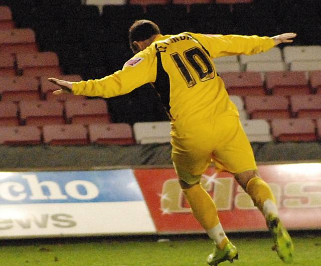 Le Fondre wheels away to celebrate his goal.