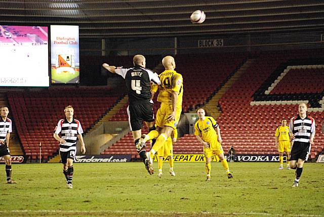 Another aerial challenge between White and Thorpe.