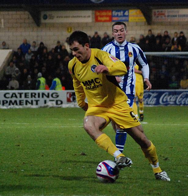 Chris Dagnall attacks the Chester backline.