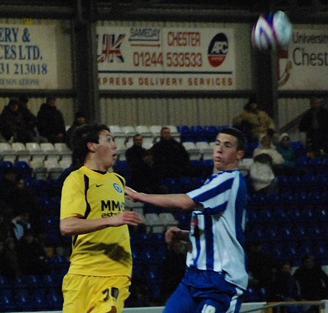 Will Buckley looks to bring the ball down.