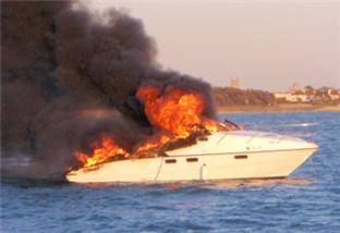 The luxury Sealine F34 vessel engulfed in flame.