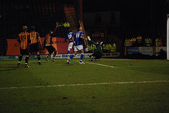 Adam Le Fondre sees his near post flick saved by Rhys Evans.