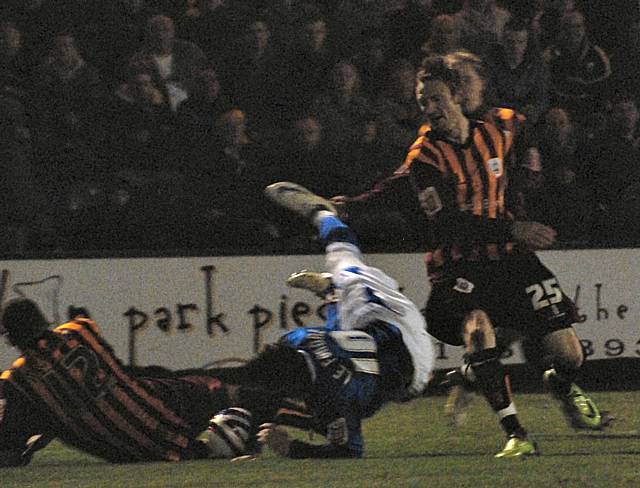 Le Fondre is brought down by Clarke and the referee awards Dale's second penalty.