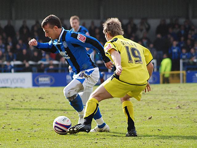 Adam Le Fondre takes on Jamie Green.