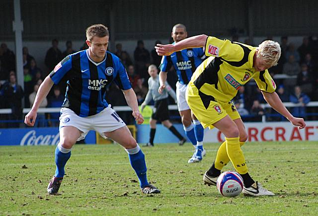 Ryan Taylor keeps the ball away from Scott Wiseman.