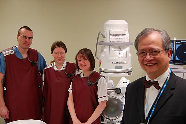 Mr. Rastislav Hejj, staff grade urologist; Miss Erika Hopwood, radiographer; Mrs Claire Stanway, radiographer; Mr. Wai Man Chow, consultant urological surgeon with the new Lithotripter.