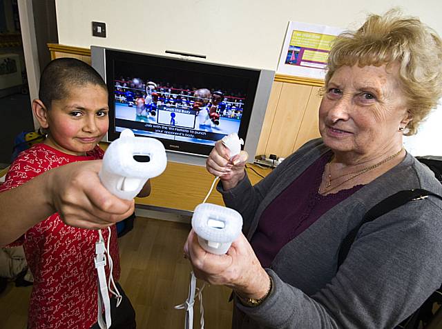 Fun: Youngsters team up with the older members of the community for a day of fun