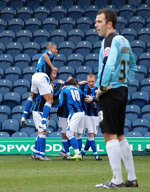 Henderson reflects on Grimsby's disastrous start while the Dale players celebrate their second.