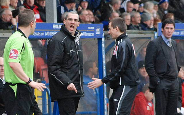 Grimsby's assistant manager has a few choice words for the linesman after believing Le Fondre was offside in the build up to Dale's second.