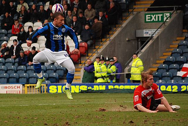 Le Fondre sees a shot blocked by Robert Atkinson.