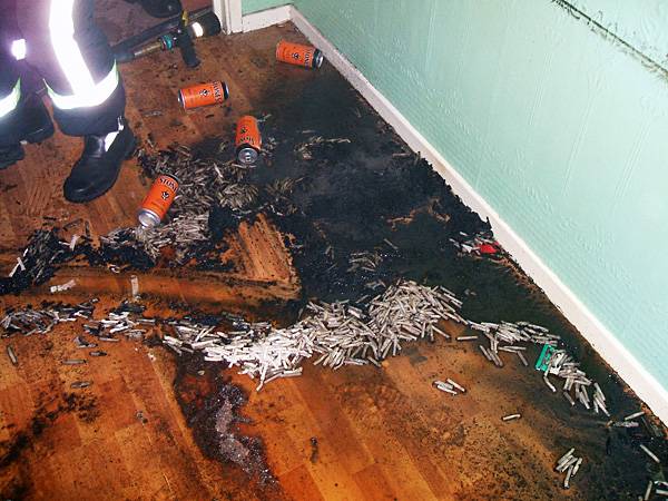 A large amount of cigarettes left on the timber laminate floor in the first floor lounge