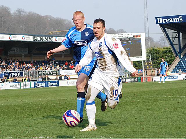 Le Fondre beats Gary Holt to the byline.