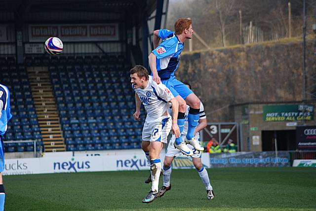 Matt Harrold clashes with Mark Jones.