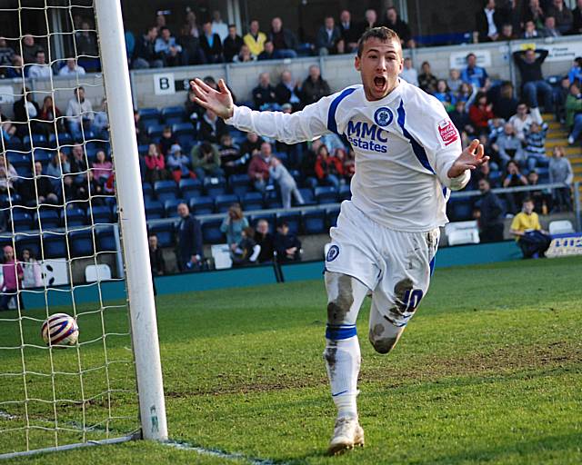 Le Fondre wheels away, ecstatic at earning his side the late win.