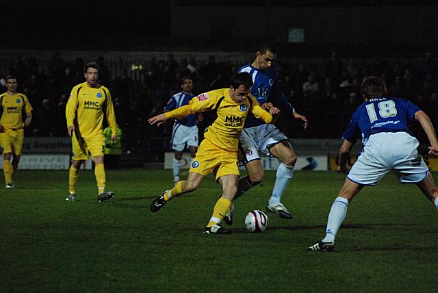 Chris Dagnall looks to get beyond Lewis Montrose.