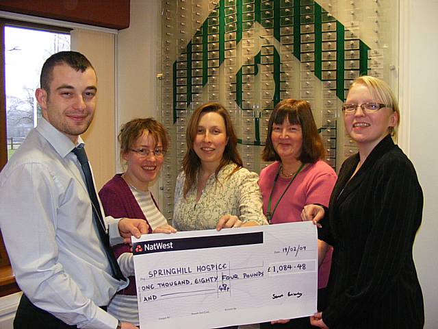 Groundwork staff, Kate Harcus, Katy Lloyd, Jean Maxwell and Victoria Martin present Dean Connaughton from Springhill with the cheque.