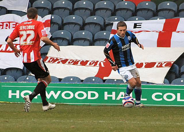 Tom Kennedy is faced by Liam Sercombe.