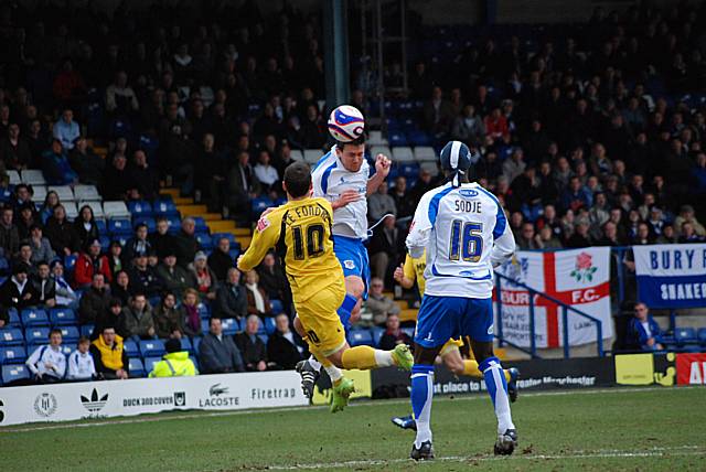 David Buchanan wins a header.