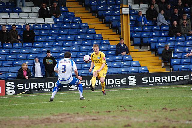 Scott Wiseman fires in a cross.