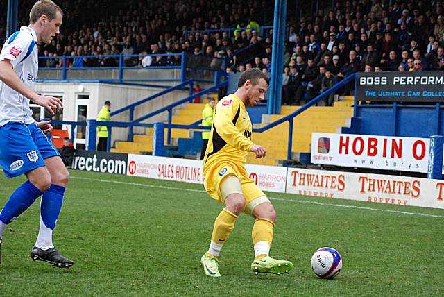 Le Fondre holds the ball away from Cresswell.