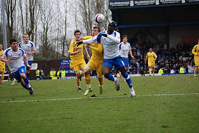 Sodje and Le Fondre battle for possession.