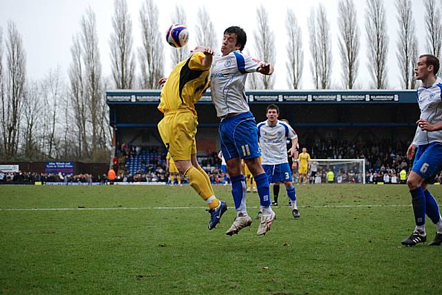 McEvilly tries to get the ball down under pressure from Barry-Murphy.