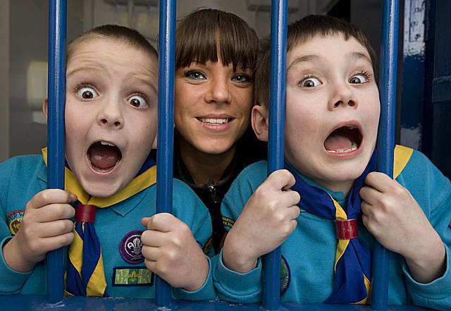 Two young beavers in the cells with PCSO Dominique Grimes.