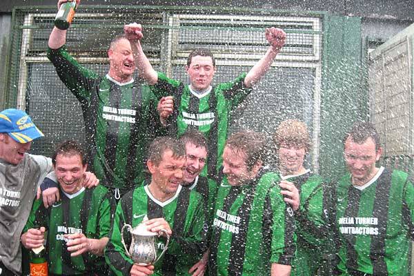 Bricklayers start the celebrations after being presented with the Denis John Trophy.