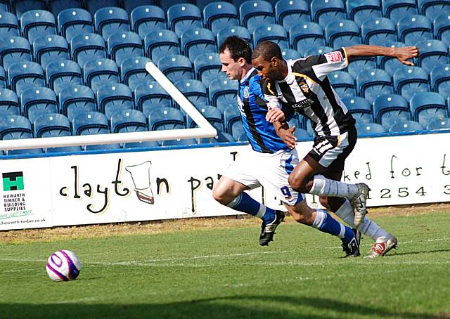 Dagnall gets past Edwards to fire in the cross from which Buckley scored the only goal of the game.