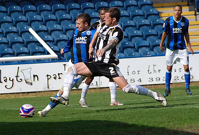 Le Fondre gets beyond Stockley to shoot.