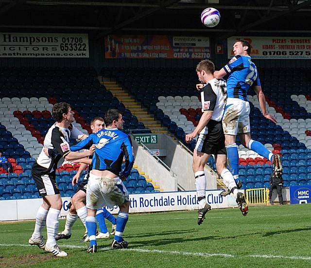 McArdle rises highest from a Dale corner.