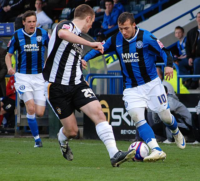 Adam Le Fondre takes on Collins.