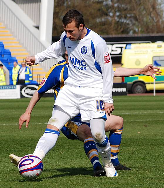 Le Fondre evades a challenge.