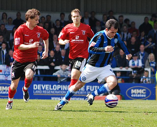 Chris Dagnall drives forward.