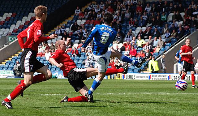 Dagnall forced a fine save from Przemyslaw Kazimierczak with this shot late in the first half.