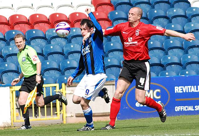 Dagnall looks to get beyond White on the touchline.