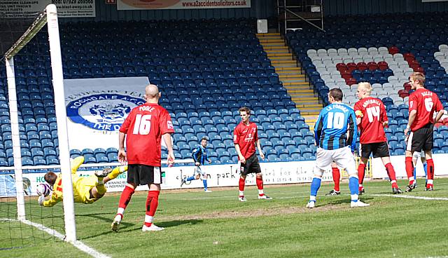 Kazimierczak watches a header go wide of the upright.