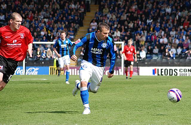 Le Fondre chases down a ball into the channel.