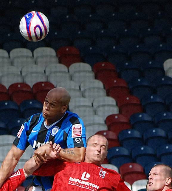 Lee Thorpe wins a header.