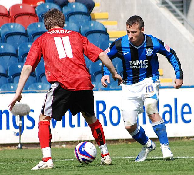 Le Fondre takes on Purdie.