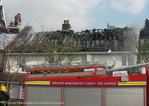 Fighting flames: Crews travelled from as far as Bury and Hyde to bring the fire under control