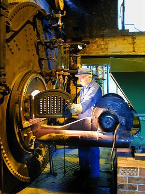 Stoking the steam engine at the Ellenroad Museum