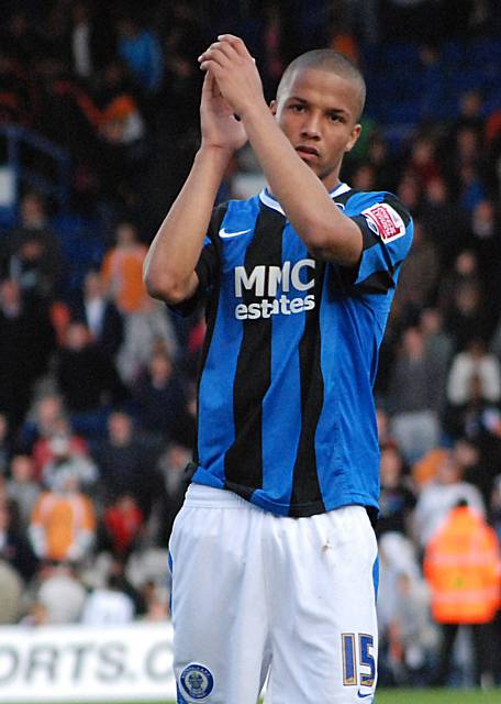 Thompson applauds the Rochdale fans at the final whistle.