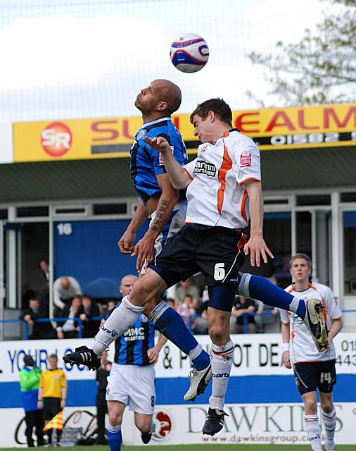 Thorpe and Pilkington challenge for another aerial ball.