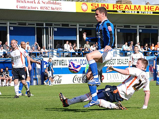 Rundle brings the ball down at the back post before scoring Dale's equaliser.