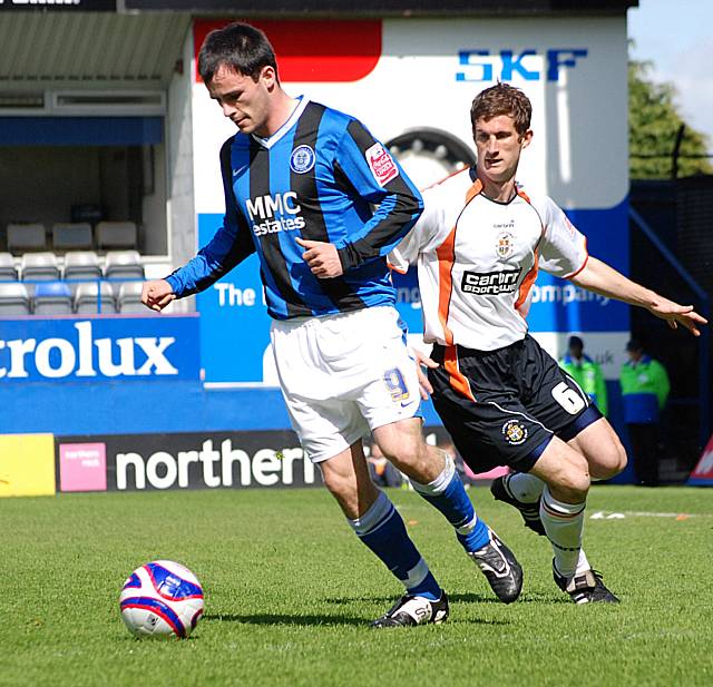 Dagnall turns away from George Pilkington.