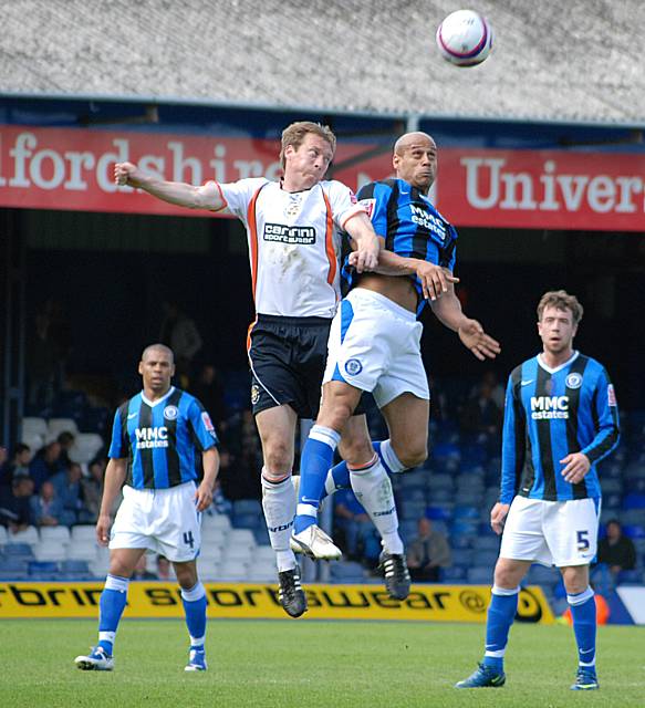 Thorpe rises with Livermore for a header.